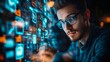 © Juan - Programmer analyzing data with digital interface