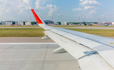 Wall Mural - View from the airplane window during takeoff at Sheremetyevo airport at summer