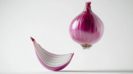 164. Floating red onion and a slice isolated on a white background, creating a sense of motion and emphasizing the natural beauty and color of the onion