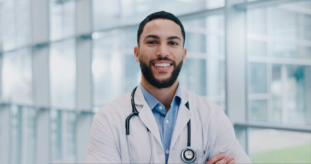 Poster - Doctor, man and happy with arms crossed in portrait at hospital with pride for medical career. Person, smile and healthcare professional in corridor at clinic for wellness, services and job in Mexico