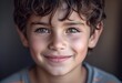 © AEMAEM - Portrait of a Smiling Boy