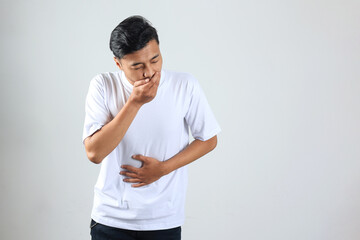 Asian Man Putting Hands on His Belly or Stomach Ache on White Background.