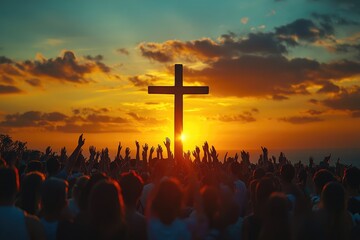 Crowd cheering at religious event at sunset with cross