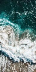 Sticker - Aerial View of Ocean Waves Crashing on Sandy Beach