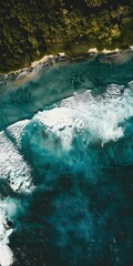 Wall Mural - Aerial View of Turquoise Ocean Waves Crashing on Sandy Shore