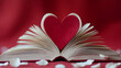 © Neural9 Project - A Red Heart Stands Open on Top of a Book with White Petals Scattered Around it on a Red Surface