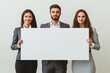 © HEPJAM ai & 3D PNG - A team of businessmen and businesswomen holding a blank white billboard isolated on a white background.