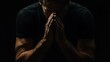 © zen - God, worship and man with hands praying for help, hope and guidance in dark studio. Pray, thank you and Christian male in prayer for hope, gratitude and holy praise, faith or blessing to Jesus