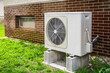 © Brebca - New air source heat pump installed outside of family house