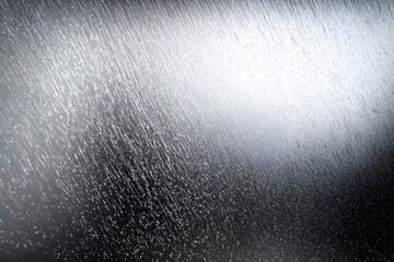 Wall Mural - silver metallic grainy texture background is reflecting light