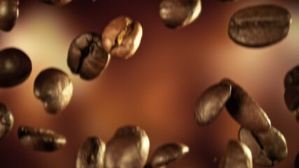 Aufkleber - Super Slow Motion of Falling Coffee Beans. Filmed on High Speed Cinema Camera, 1000 fps. Blur Abstract Smooth Bokeh Background.