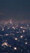 © AURA COLLECTIONS - Aerial view of a city at night, showcasing lights and network connections.