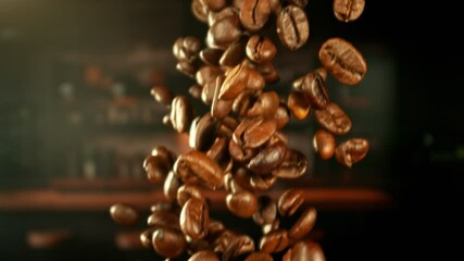 Aufkleber - Super Slow Motion of Falling Coffee Beans. Filmed on High Speed Cinema Camera, 1000 fps. Blur Kitchen Industrial Interior on Background.