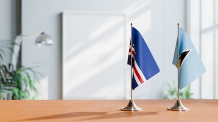 FLAGS OF CAPE VERDE AND SAINT LUCIA ON TABLE