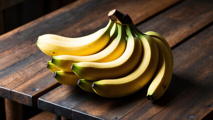 Wall Mural - Bunches of ripe yellow bananas arranged on a rustic wooden surface, highlighting their vibrant color, smooth texture, and natural curves.