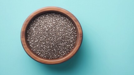 Wall Mural - Chia seeds flour on brown wooden bowl and some seeds for baking, gluten free copy space