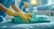 © Shrikant - Hospital Staff Disinfecting Patient Bedding with Antibacterial Solution  For Clean Healthcare