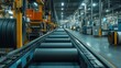 © WITTAYA  ANGMUJCHA - The rubber compounding area shows large rolls of rubber being processed and cut into precise sizes