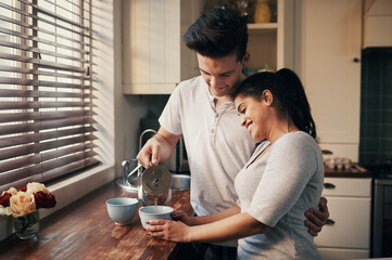 Canvas Print - Coffee, pouring and couple in kitchen with smile, bonding and getting ready to start new day. Happy, man and woman with espresso, cappuccino or latte in home with love, support and morning drink