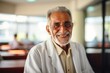 © Vorda Berge - Smiling portrait of a happy senior Mexican man in nursing home