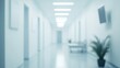 © Nuttaya Nampai - Abstract blur of a medical clinic interior with white walls and bright lighting, creating a clean and defocused background for hospital or health-related content.