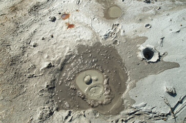 One small cold mud volcano near the town of Berca in Romania