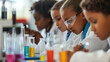 © atitaph - Large group of diverse children in lab coats in chemistry class having fun with science experiment, concept, education, learning, development