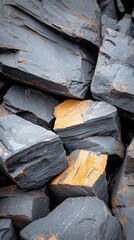 Sticker -  A stack of yellow and black rocks with a separate pile of black rocks on top