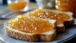© 69 - Crisp toast spread with glossy, vibrant orange marmalade, capturing its realistic texture and tangy appeal.