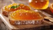 © 69 - Crisp toast spread with glossy, vibrant orange marmalade, capturing its realistic texture and tangy appeal.
