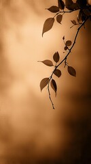 Wall Mural -  A monochrome image of a leafy branch against a browning sky backdrop