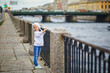 © Ekaterina Pokrovsky - Adorable preschooler girl walking on the Fontanka river embankment in St. Peterburg, Russia.