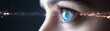 © TENTIP - Close-up of a blue eye with futuristic digital data overlay, representing technology, innovation, and future vision.