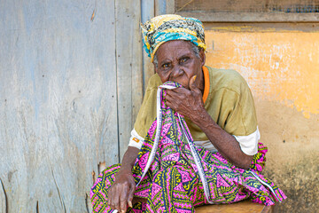 Old woman sitting down 