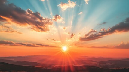Poster - The sun is setting over a mountain range, casting a warm glow over the landscape
