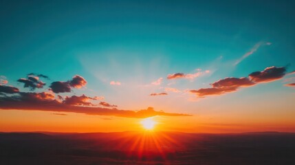 Wall Mural - the sun is setting over a beautiful blue sky