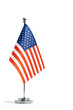 © freeman83 - Table flag American on metal flagpole, highlighted on white background.