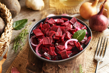 Wall Mural - Fermented red beet kvass in a bowl with onions, garlic and spices