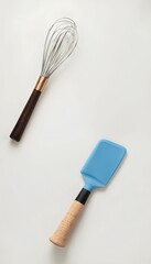 Kitchen utensils: whisk and spatula, baking tools on white background, cooking equipment, food preparation appliance, gadget, mixer, chef cookware, utensil