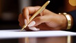 © MarGa - Close-up of a hand writing on paper with a gold pen, symbolizing decision-making, creativity, or signing important documents. This image fits the concept of legal work or voting