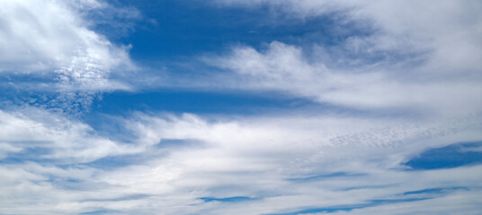 blue heaven and white clouds. sky clouds background. white cloudy on heaven with soft sun light. clo