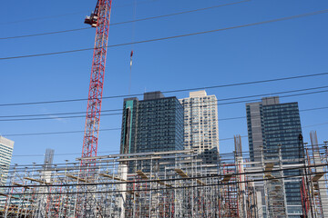 The tower crane. Tower Cranes. Construction of Skyscrapers. Tower Crane on formworks. Crane and building construction. Construction crane on Housing.