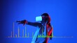 © Summit Art Creations - Smiling woman listening and dancing on fun song using VR headset with graphic equalizers electronic modern at studio dynamic lighting in music and technology concept blue background. Hallucination.
