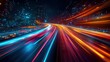 © fourtakig - Ethereal long-exposure image of a road at night with vibrant multicolored streaks of light tracing the vehicles' movements suggesting a sense of speed and technology