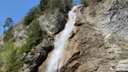 Wall Mural - Dundelbachfalls waterfalls or waterfall Dundelbachfall (waterfalls on the alpine stream Dundelbach), Lungern, Switzerland - Dundelbachfälle Wasserfälle oder Wasserfall Dundelbachfalle (Schweiz)