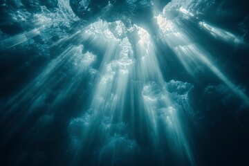 Wall Mural - Underwater Sunbeams Illuminating a Rocky Seabed