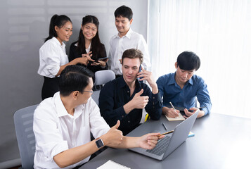 Wall Mural - Group of diverse office worker employee working together on strategic business marketing planning in corporate office room. Positive teamwork in business workplace concept. Prudent