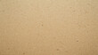 © Your Hand Please - brown eco-friendly recycled kraft paper texture. The natural fiber surface showcases subtle variations, perfect for conveying themes of sustainability, simplicity, and organic materials