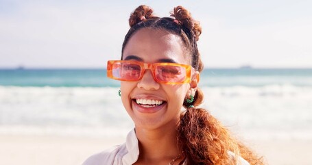 Poster - Happy, sunglasses and portrait of woman at beach for vacation, holiday and weekend in nature. Travel, summer fashion and person by ocean, sea and outdoors for adventure, wellness and fun in Brazil