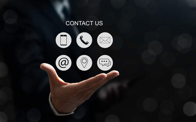 Contact us Concept. Businessman with the email, call phone, address, Chat message icons represent customer support hotline people connection.